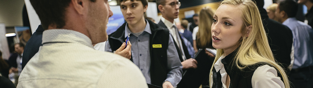 People talking at a conference