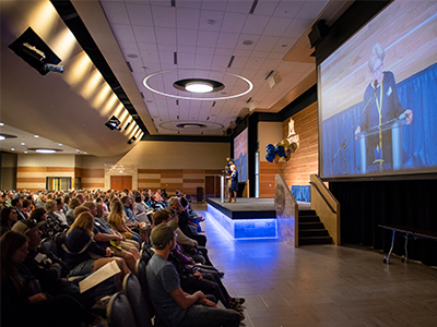 Ronda Russell, director of Admissions, addresses a crowd at MSU Friday.