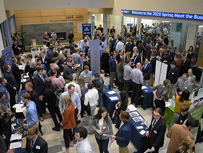 Numerous recruiters and students mingle in the Forum of Jabs Hall