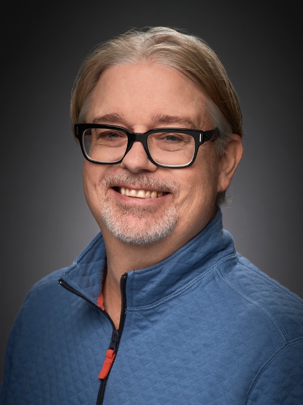 Skip Anderson Portrait of a man in glasses