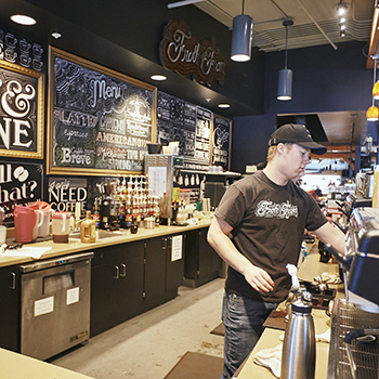 student working in the froth and foam coffee concept in miller dining commons