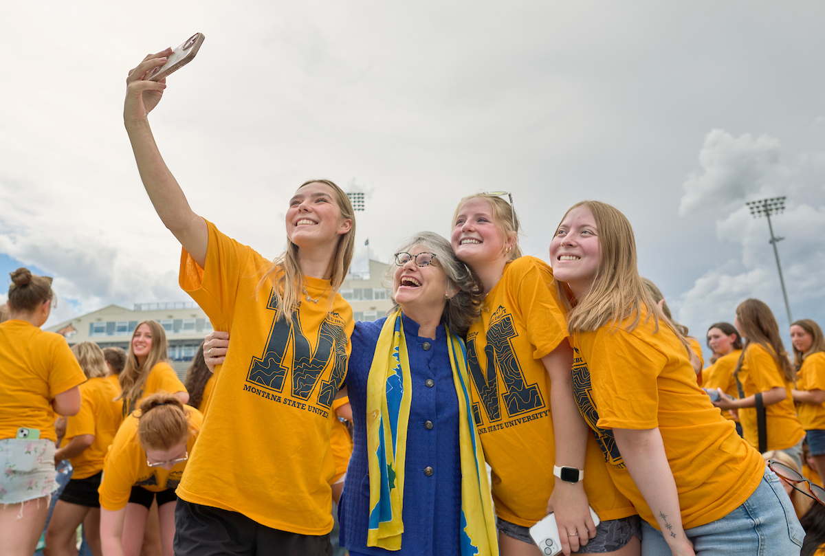 students taking selfie