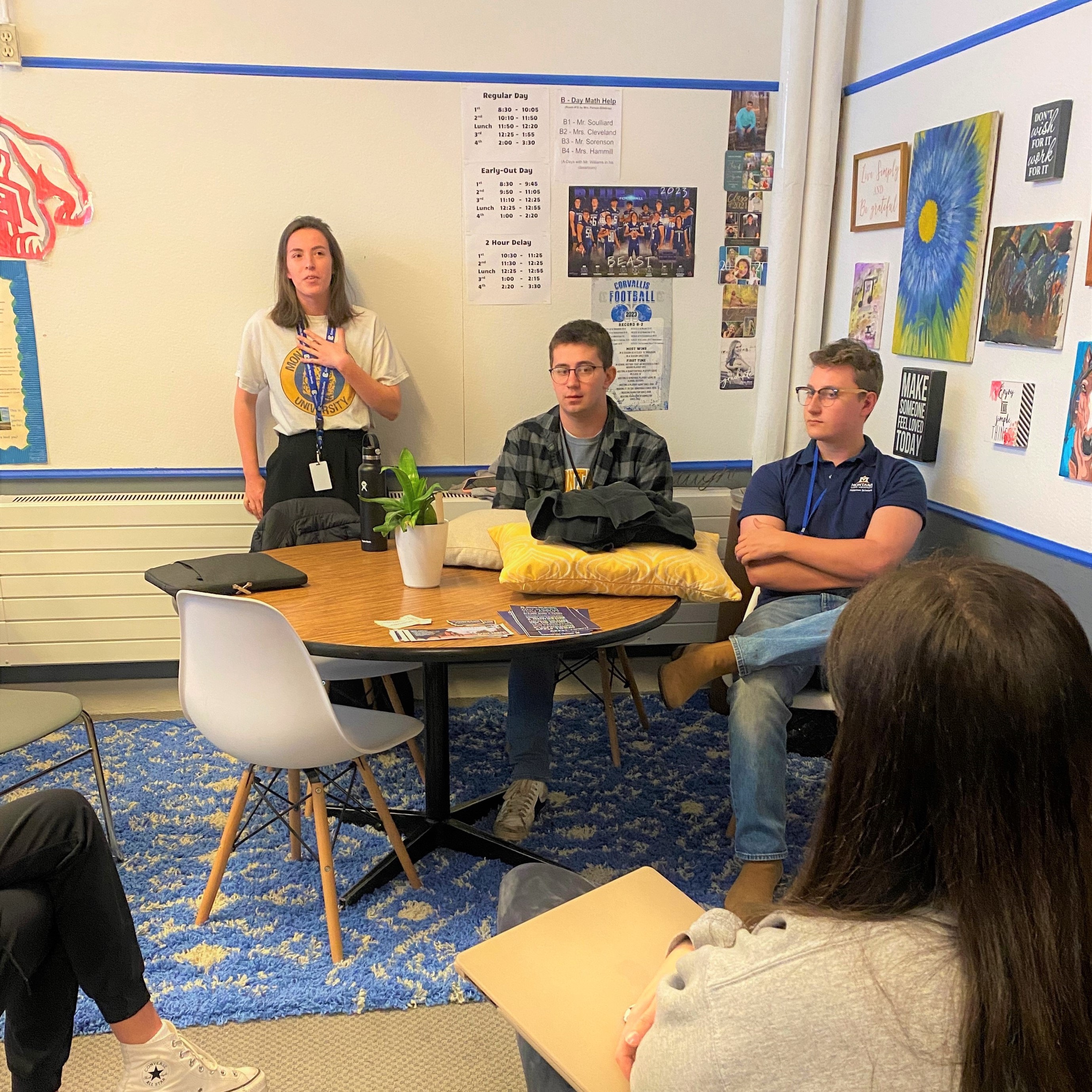 students listen to presentation about the program