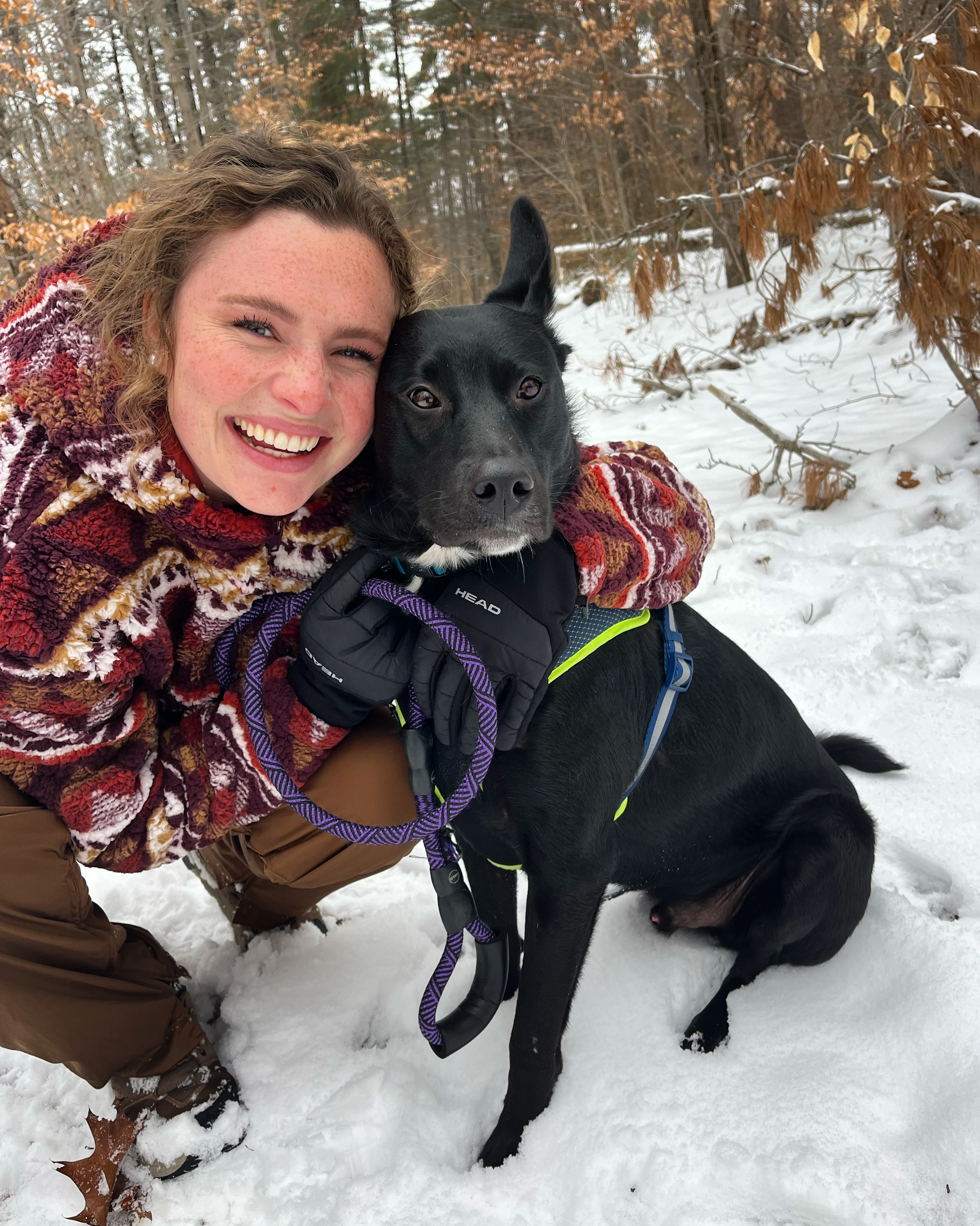 Victoria Nelson and her dog in the snow