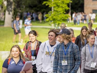 incoming students being led on a tour