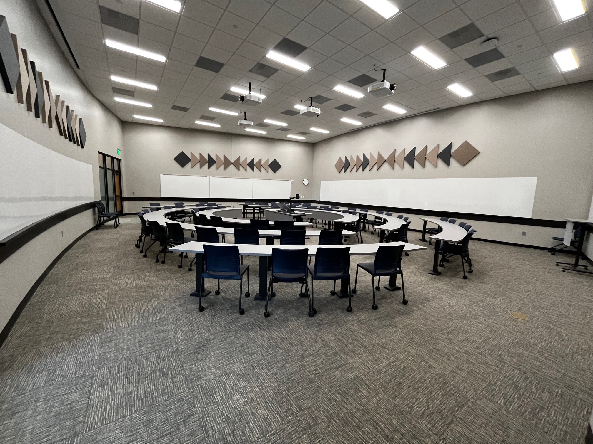 AIH 166 a large round style classroom from the entrance