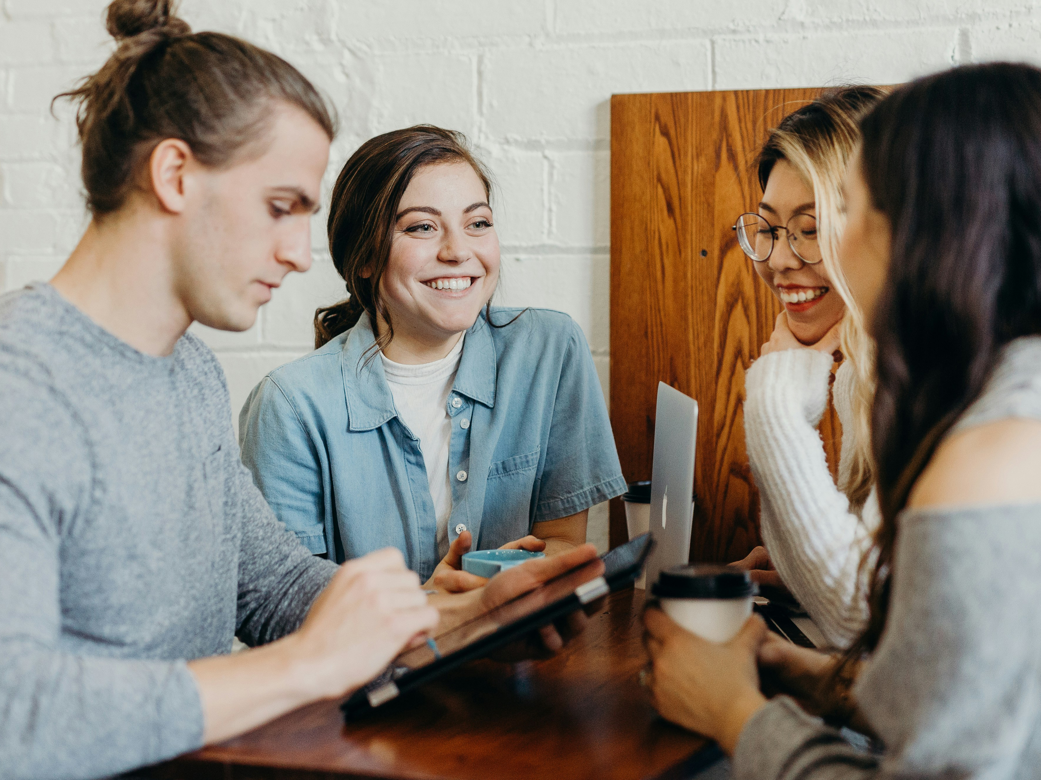 Stock image of a group of people conversing